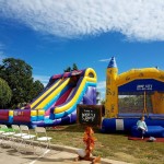 inflatable bounce houses in a park