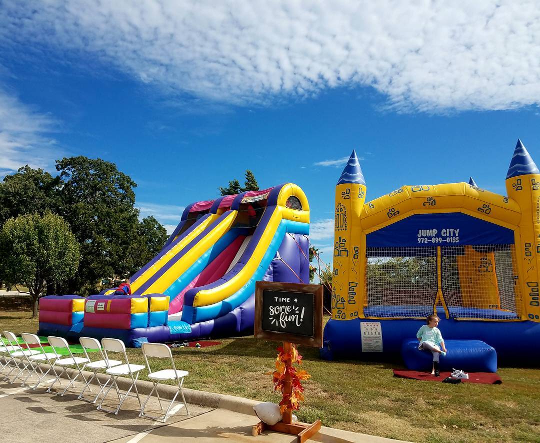 inflatable bounce houses in a park