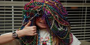 kid with beads