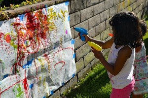 squirt-gun-painting-station-summer-party-idea