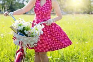 girl-walking-with-bike