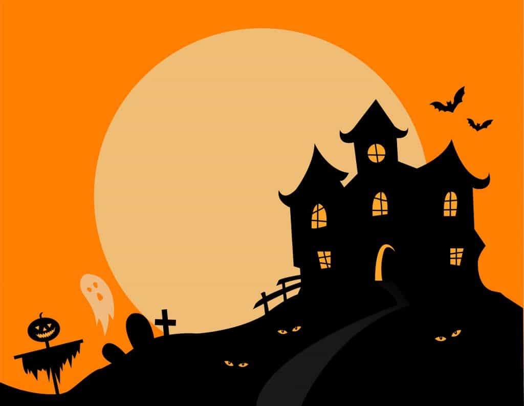 old haunted house sitting on a hill on an orange nigh sky