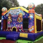 It's a Girl THing bounce house on grass outside front view