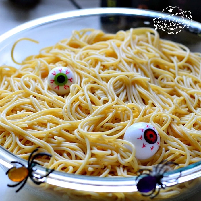 Halloween spaghetti with plastic eyeballs